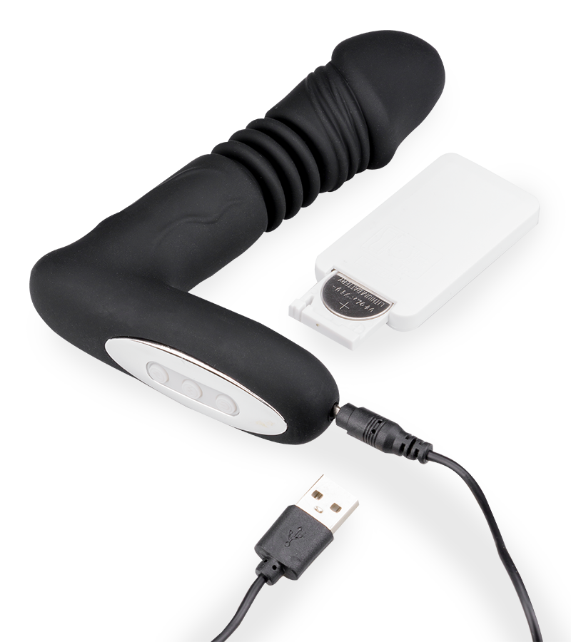 Heated thrusting and vibrating dildo