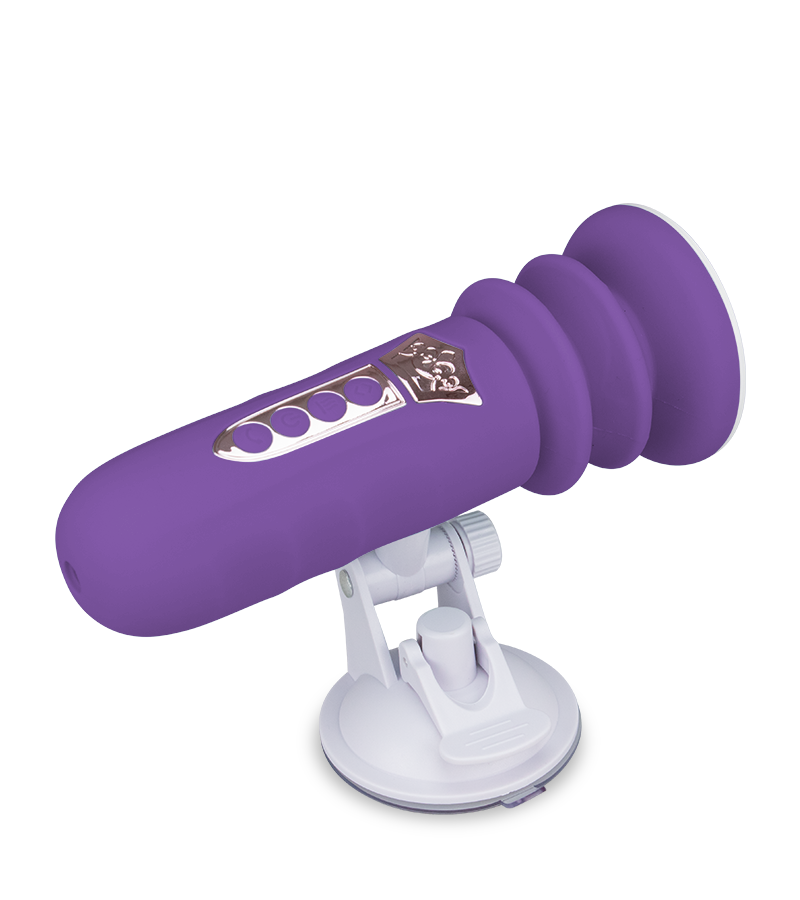 Mini sex machine with thrusting suction cup dildo