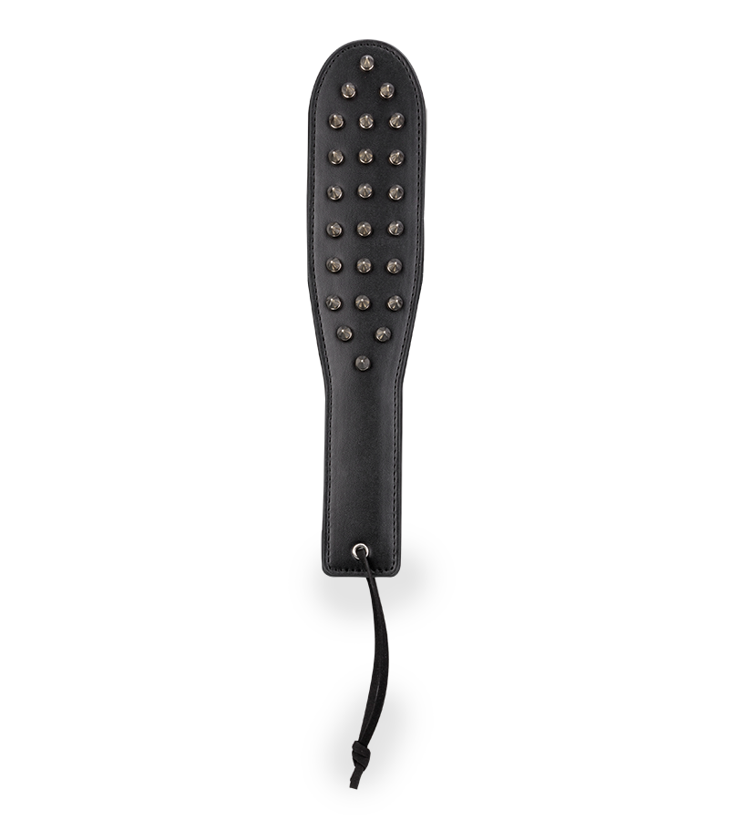 Spike faux leather paddle with metal spikes