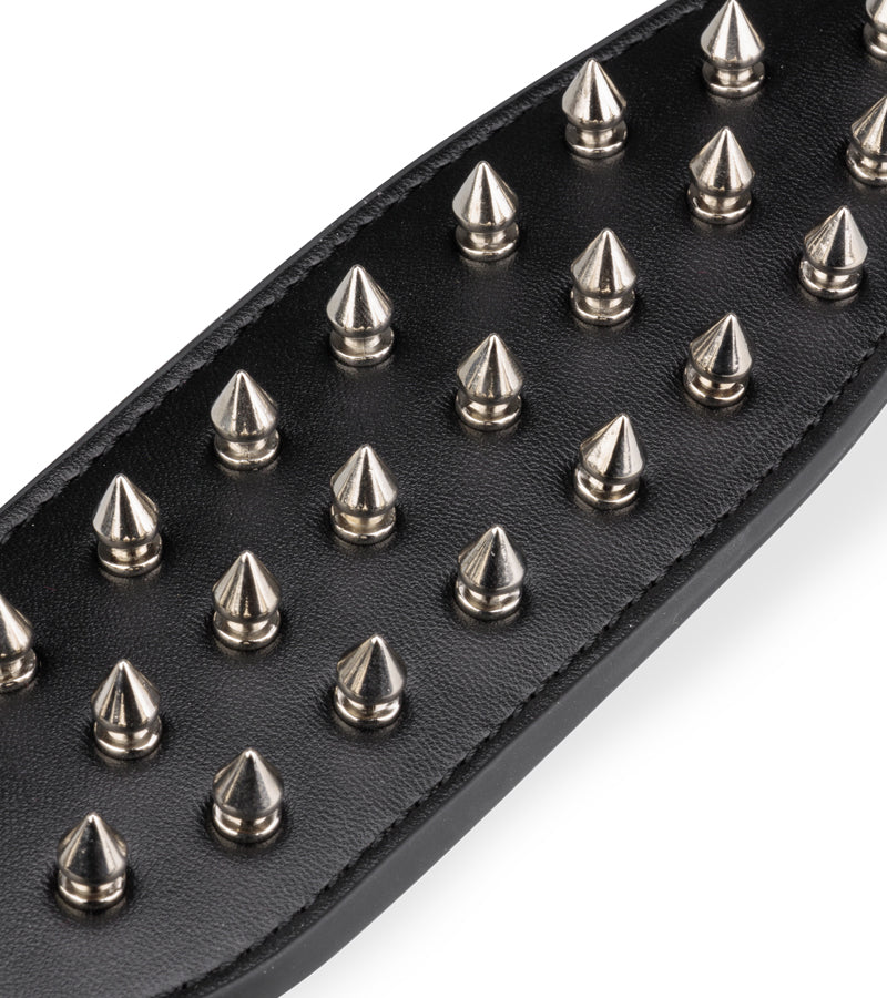 Spike faux leather paddle with metal spikes