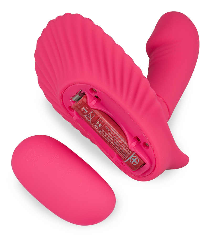 Wearable vibrating shell dildo